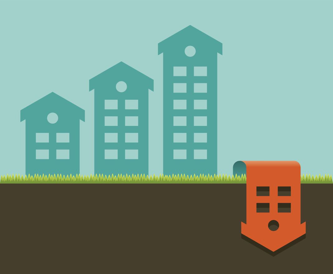 Houses depicting bar graph showing the drop in real estate