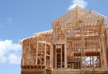 Spiking lumber prices drive up home construction costs