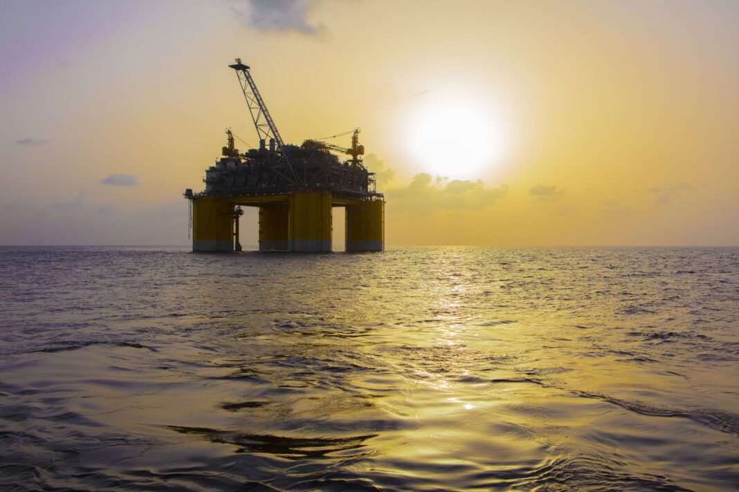 Offshore platform at sunset in Gulf of Mexico