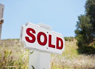 This company just bought land for a large warehouse near the Woodridge subdivision